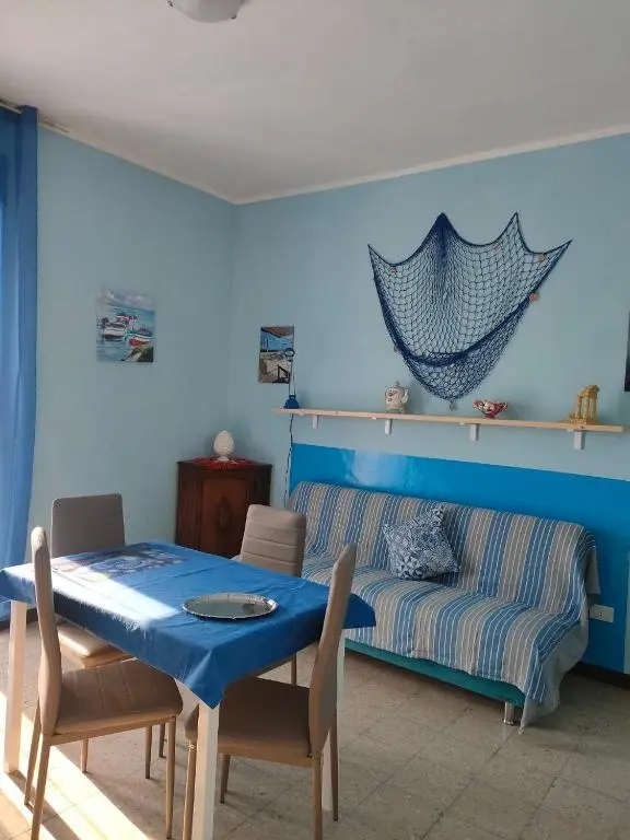 sala-da-pranzo-salotto-casa-vacanza-nautilus